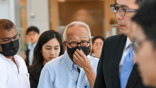 Singapore charges hotel tycoon in case linked to jailed minister