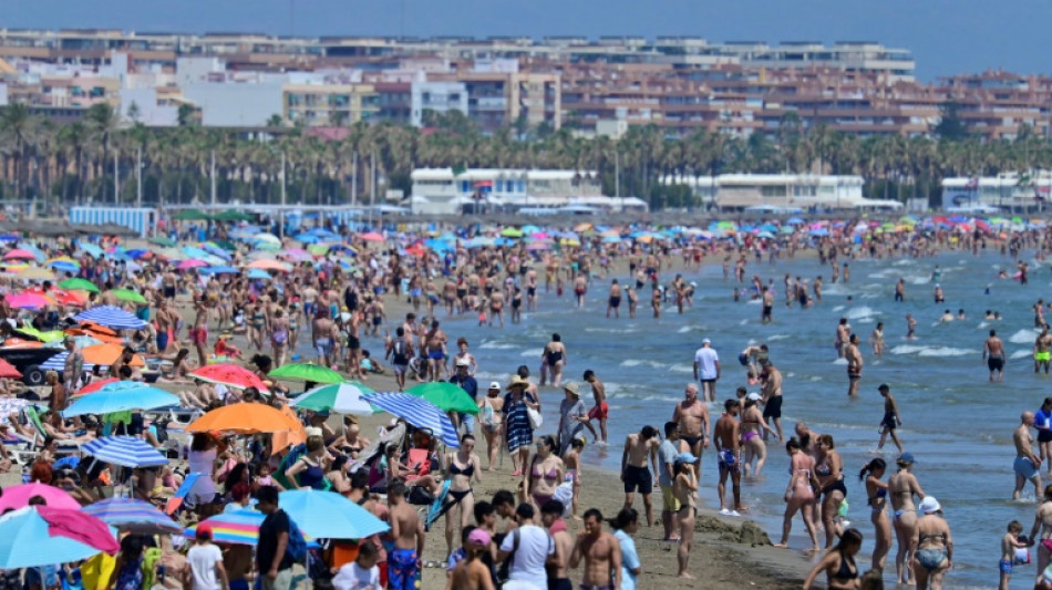 Spain logs record summer tourism as inflow draws protests