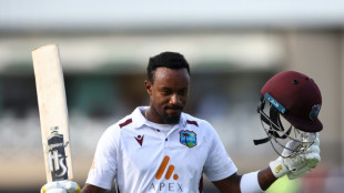 West Indies century-maker Hodge glad to survive 'brutal' Wood battle