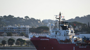 Ship carrying 230 migrants docks at French port