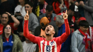 Atletico hold on to keep advantage on Dortmund