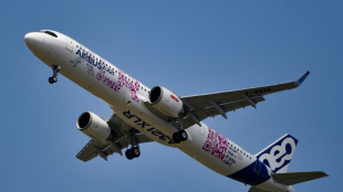 Airbus first-half net profit halved to 825 mn euros 