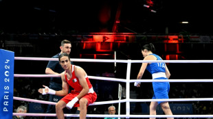 Algerian boxer in Olympic gender row wins in 46 seconds