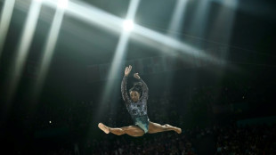 Biles dazzles in Paris Olympics opening beam routine