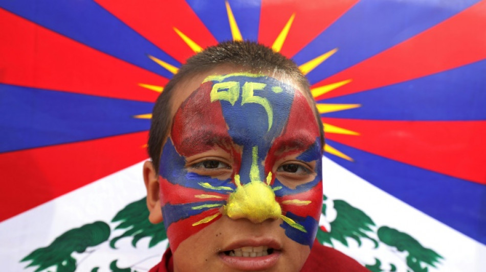 Tibetanos exiliados se manifiestan en el 65 aniversario de su levantamiento fallido
