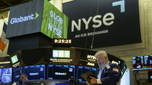 Wall Street limite les pertes et termine modestement dans le rouge