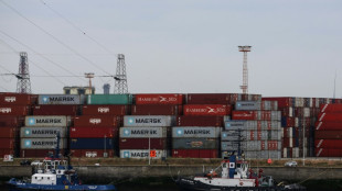 US exports hit new record in June, lowering trade deficit