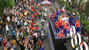 Philippines holds victory parade for two-gold Olympic gymnast Yulo