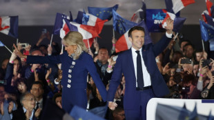 France's Macron wins new term after far-right battle