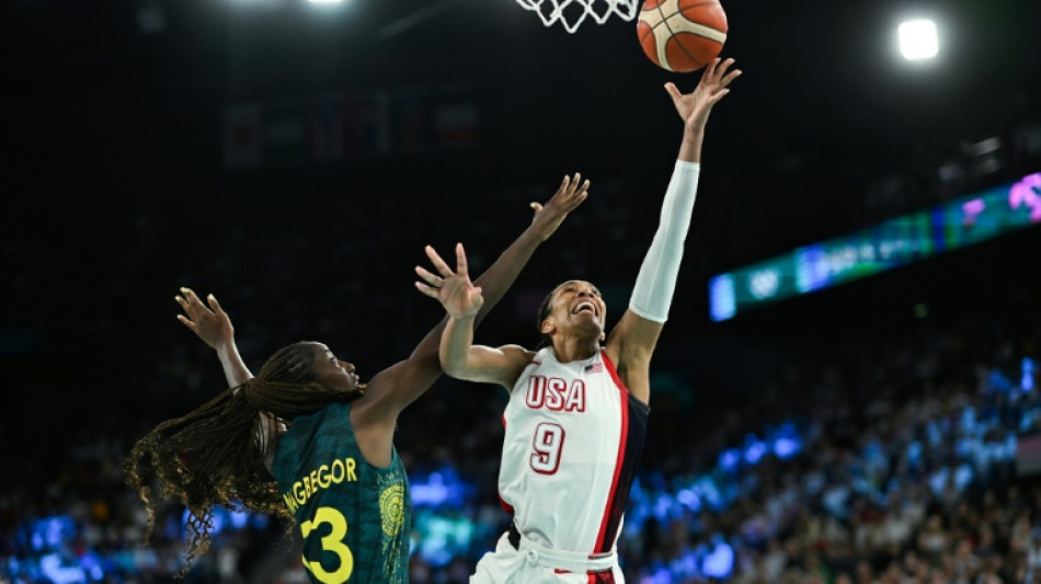 US women chase record basketball gold against France team lifted by 'love'