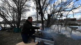 Russia says 'colossal' amount of river water approaching Siberian city