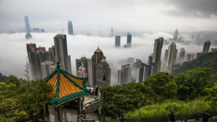Hong Kong's top scientsts urge shift from Beijing's zero-Covid