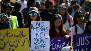 Thousands of women rally in Pakistan despite legal hurdles