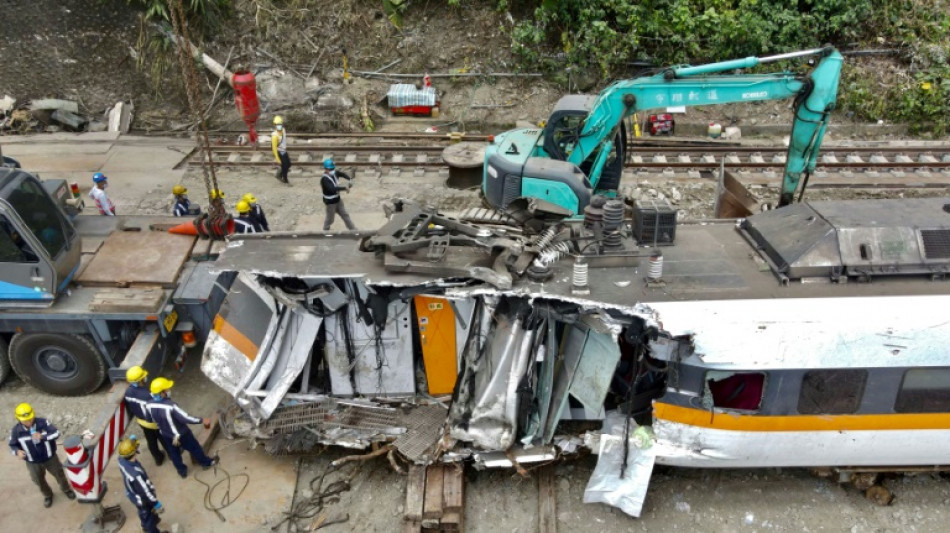 Taiwan truck driver jailed for train crash killing 49