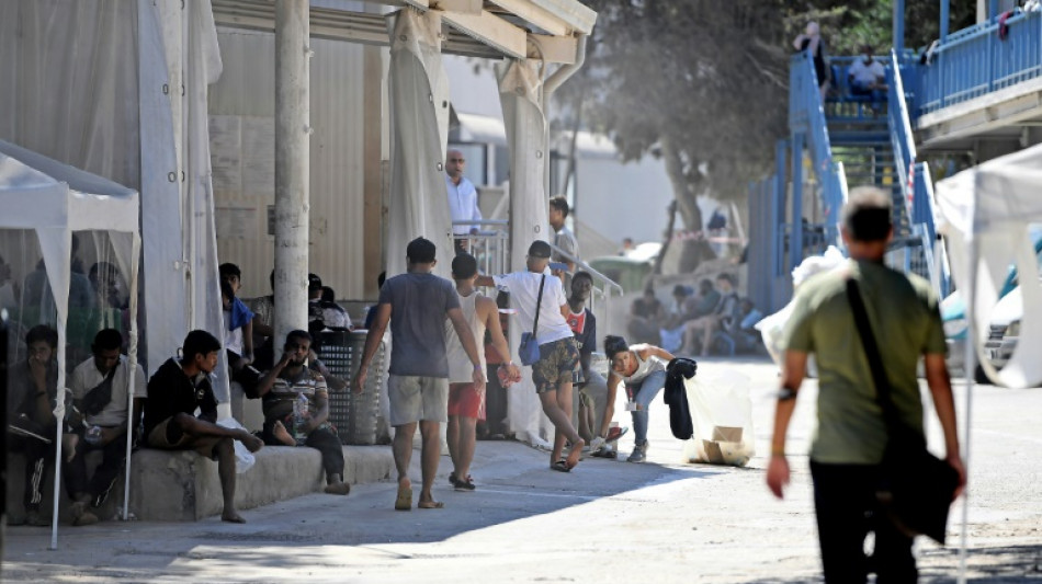 On Lampedusa, migrant worries leave locals behind