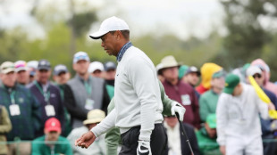 Woods fading in pursuit of Masters miracle