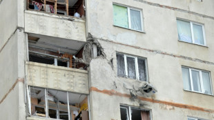 Street fighting in Ukraine as hundreds of thousands flee