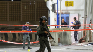 Israeli forces hunt east Jerusalem checkpoint attacker