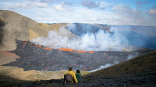 Spectators flock to Iceland volcano