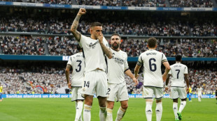 Real Madrid claim 36th Spanish title after Girona stun Barca