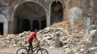 Three Iraqis remember IS horrors in Mosul a decade on
