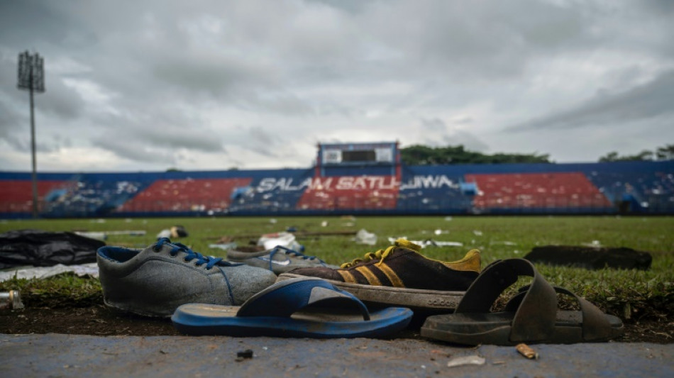 Indonesia probes elite officers as stadium disaster death toll rises