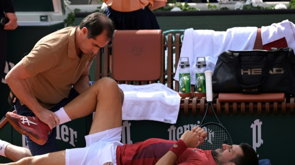 Djokovic out of French Open with knee injury