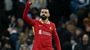 Salah-inspired Liverpool beat Man City to open up 11-point Premier League lead