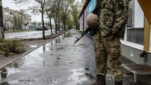 Last residents of east Ukraine ghost city brave Russian bombs