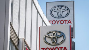 Toyota keeps net profit forecast despite production woes