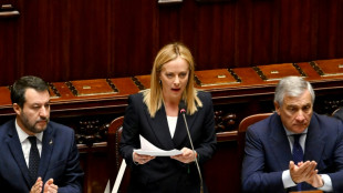 Far-right Meloni seeks to reassure in first speech as Italy PM