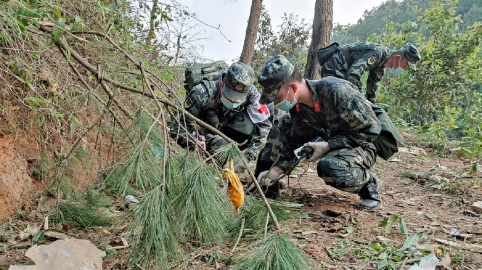 Recovery of crashed China Eastern jet hampered by heavy rain