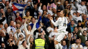 Modric stunner maintains Real Madrid title charge