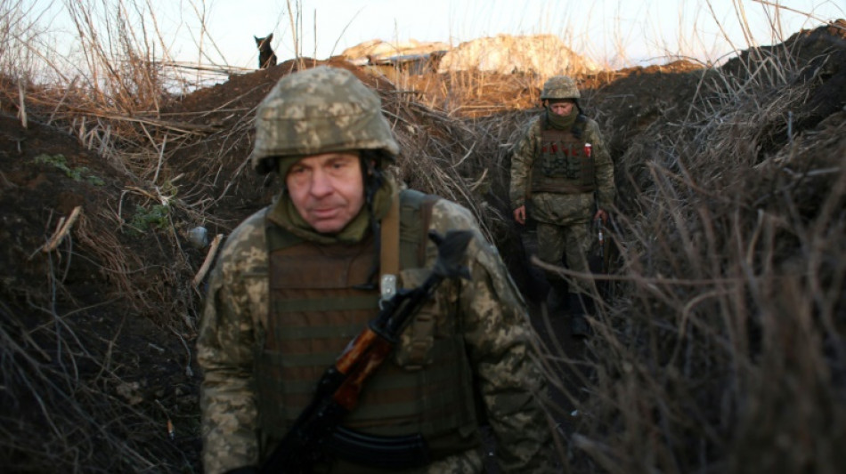 Ukraine urges 'tough sanctions' after Putin orders troops into rebel regions