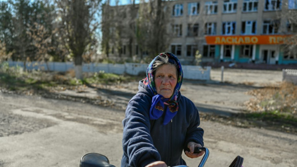 War and peace collide in Ukraine's recaptured ruins