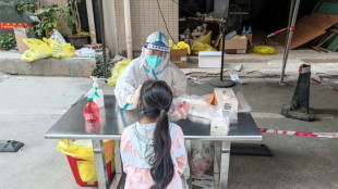 Shenzhen eases lockdown as pandemic gnaws at China economy