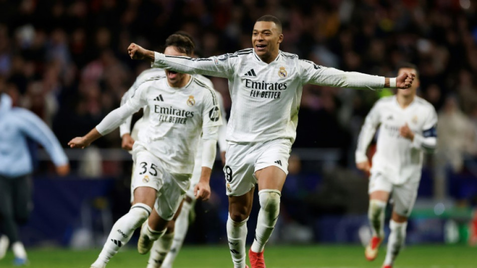 Real Madrid edge Atletico on penalties to reach Champions League quarters