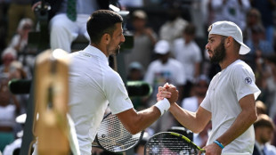 Djokovic survives rookie test as Wimbledon craves Murray magic