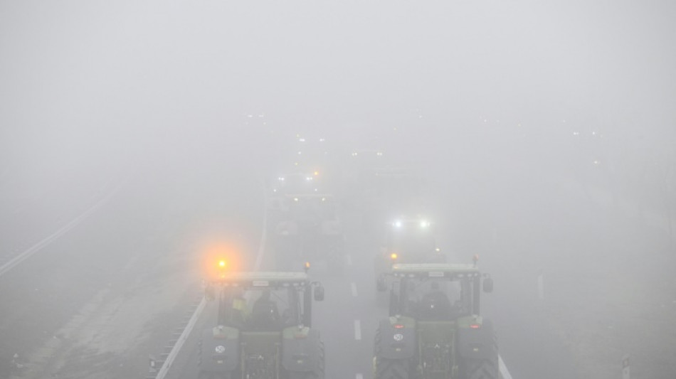 Spanish farmers block roads for second day