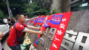 Football fans allowed for China's Covid-delayed kick-off