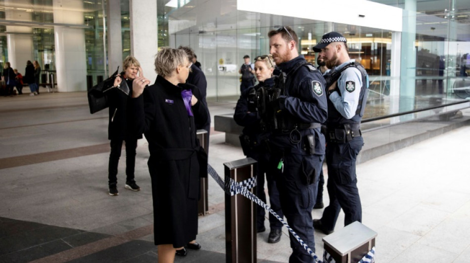 Gunman detained after firing shots in Canberra airport