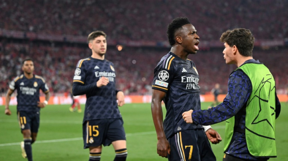 Vinicius hits brace as Real Madrid come back to snatch draw at Bayern