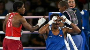 Boxer Ngamba settles for bronze as Refugee Olympic Team celebrate first medal