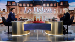 Le Pen, Macron clash in debate ahead of French election