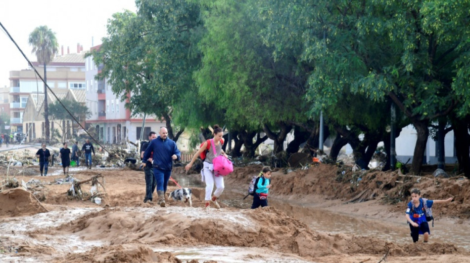 Spain races to save victims as floods kill 64