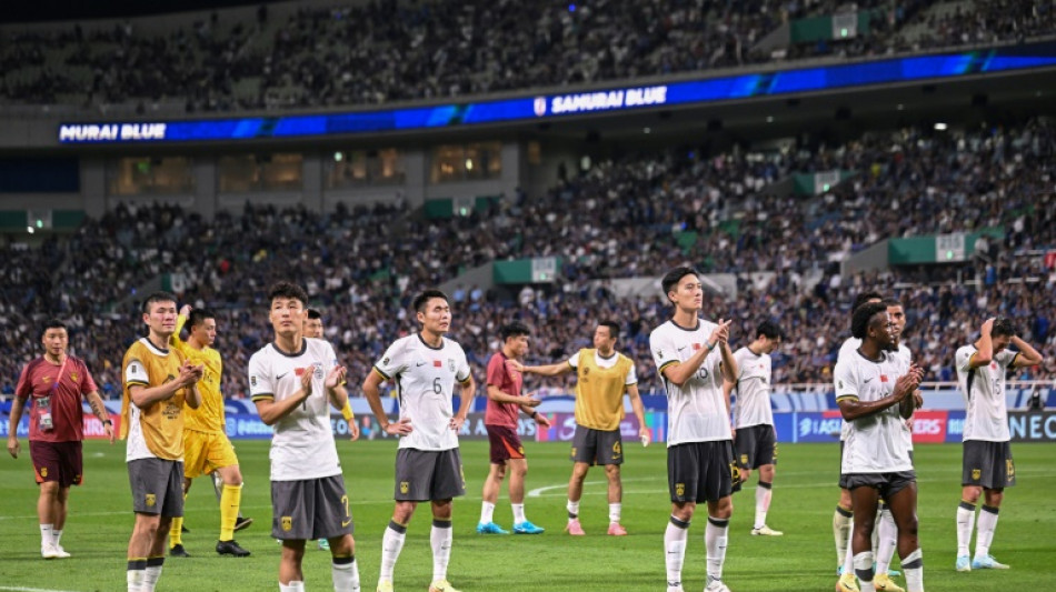 Chinese football numb after 'disastrous' 7-0 Japan thrashing