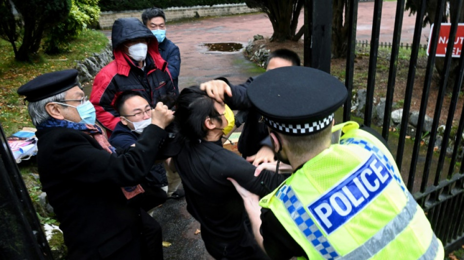 China blames 'troublemakers' after consulate protest assault in UK